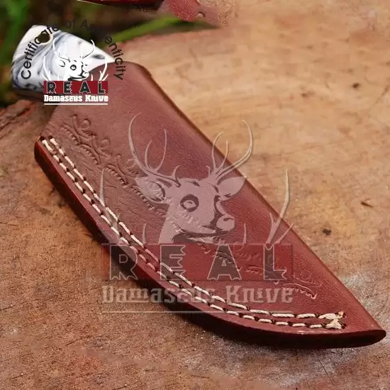 https://www.realdamascusknive.com/image/cache/cache/1001-2000/1575/additional/c221-hand-forged-railroad-spike-carbon-with-sheath-0-1-550x550.webp